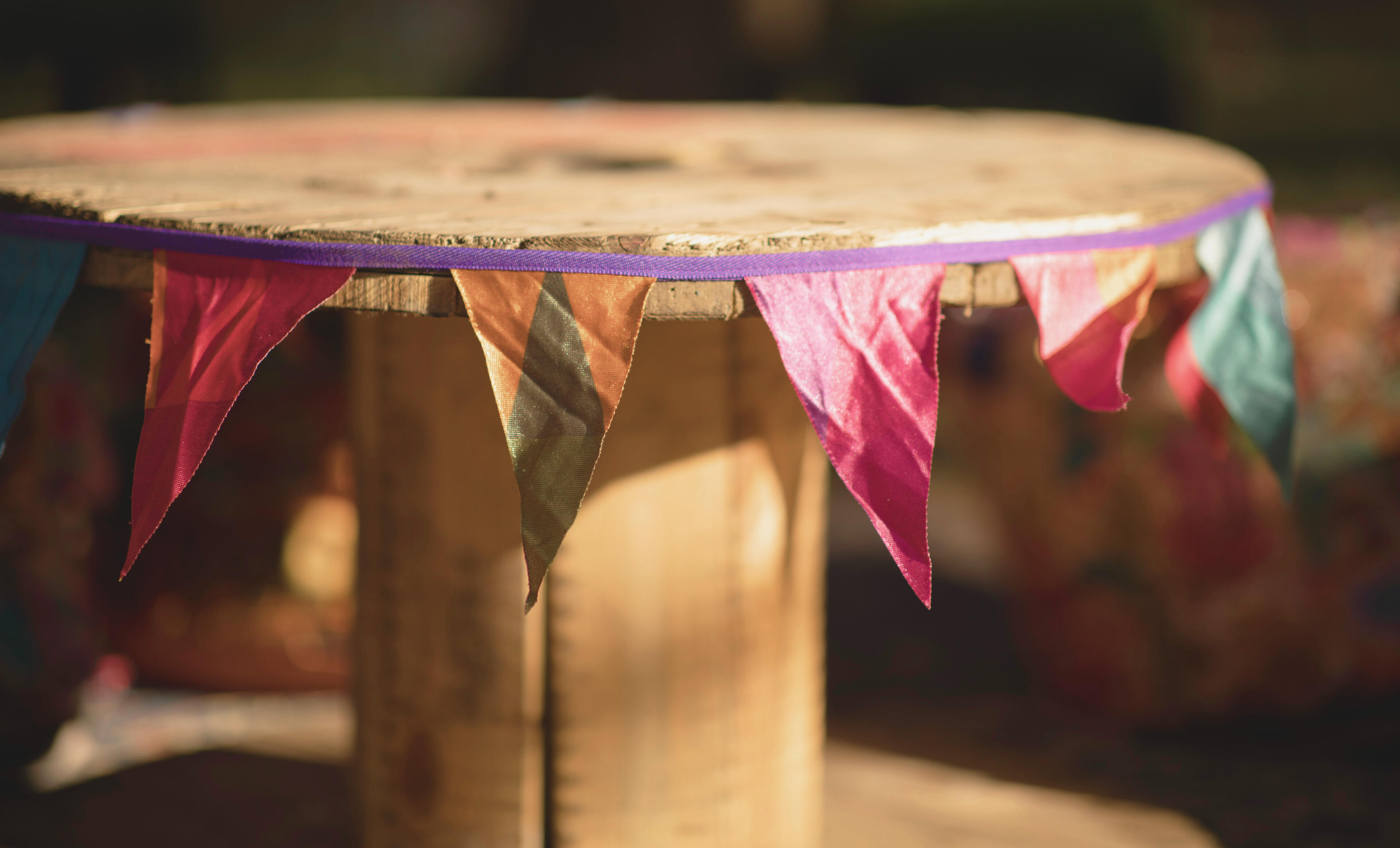 Wild Fringe Bunting Wild Fringe Bunting decorating a long table lunch in a poly-tunnel