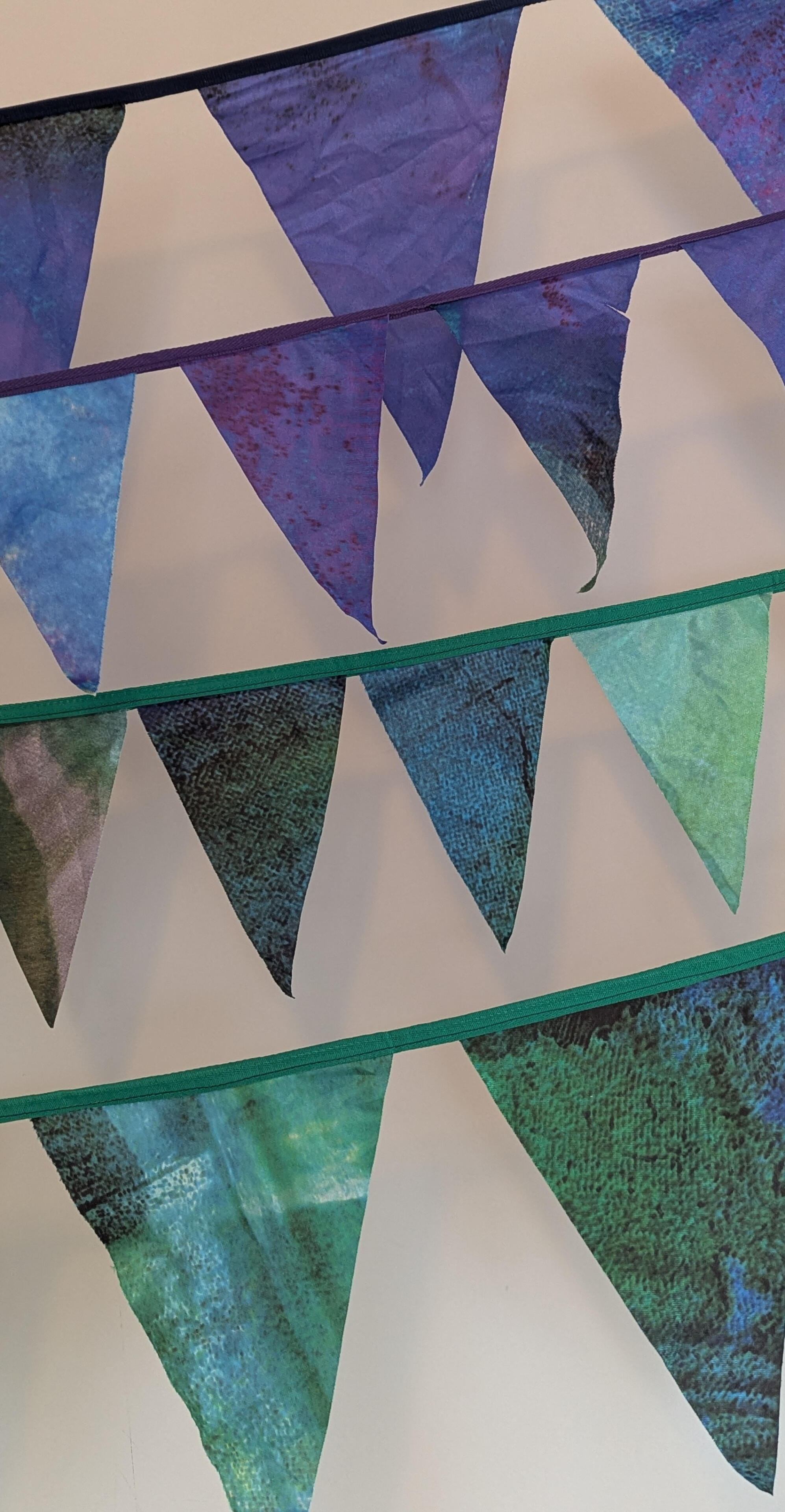 Wild Fringe Bunting Wild Fringe Bunting decorating a long table lunch in a poly-tunnel